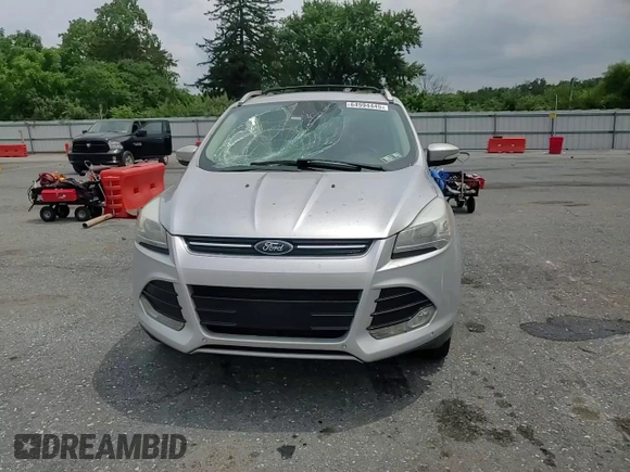 2013 Ford Escape Titanium with VIN 1FMCU9J9XDUB88989, listed as a Copart auction lot 64994445 with 192,833 mi miles and Salvage title. Bid and sale history available at DreamBid. Image 13.