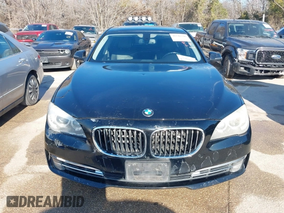 2013 BMW 7 Series 740i with VIN WBAYA6C55DC995094, listed as a IAAI auction lot 41246796 with 164,394 mi miles. Bid and sale history available at carsss.com. Image 6.