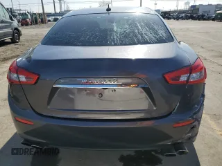 2016 Maserati Ghibli S Q4 z VIN ZAM57RTA8G1173582, wystawiony jako Copart lot #56072145 z przebiegiem Nie podano mil oraz Szkody całkowita. Historia ofert i sprzedaży dostępna na DreamBid. Obrazek 6.