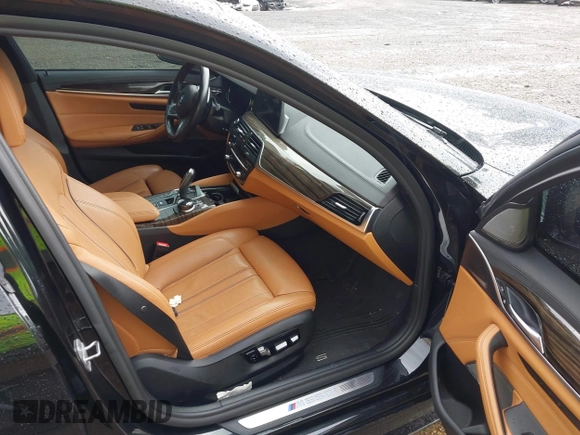 2018 BMW 5 Series M550i xDrive with VIN WBAJB9C5XJB286923, listed as a IAAI auction lot 42527301 with 76,923 mi miles and . Bid and sale history available at DreamBid. Image 5.