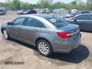 2012 Chrysler 200 Touring with VIN 1C3CCBBGXCN326023, listed as a IAAI auction lot 42126529 with 163,325 mi miles and . Bid and sale history available at carsss.com. Image 3.