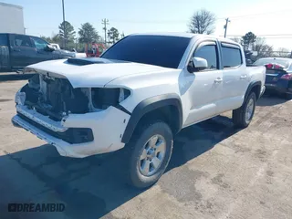 2019 Toyota Tacoma 4WD SR with VIN 5TFCZ5AN6KX194425, listed as a IAAI auction lot 41345357 with 79,574 mi miles. Bid and sale history available at carsss.com. Image 18.