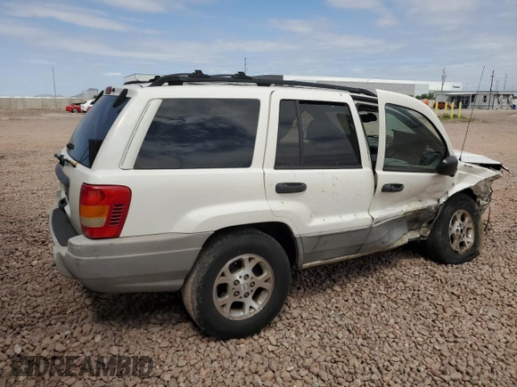 2000 Jeep Grand Cherokee Laredo with VIN 1J4G248S4YC222194, listed as a Copart auction lot 53809825 with Not provided miles and Salvage title. Bid and sale history available at DreamBid. Image 3.