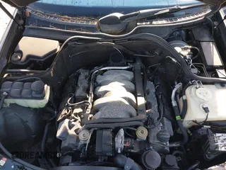 2003 Mercedes-Benz CLK 4.3L with VIN WDBLK70G13T144039, listed as a IAAI auction lot 42013311 with 121,440 mi miles. Bid and sale history available at carsss.com. Image 10.