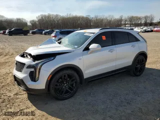 2019 Cadillac XT4 FWD Sport with VIN 1GYFZER40KF200700, listed as a Copart auction lot 49125055 with 83,765 mi miles and Salvage Title. Bid and sale history available at carsss.com. Image 1.