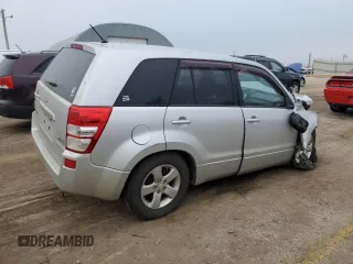 2012 Suzuki Grand Vitara Premium z VIN JS3TD0D66C4100621, wystawiony jako Copart lot #86968164 z przebiegiem Nie podano mil oraz Szkody całkowita. Historia ofert i sprzedaży dostępna na DreamBid. Obrazek 3.