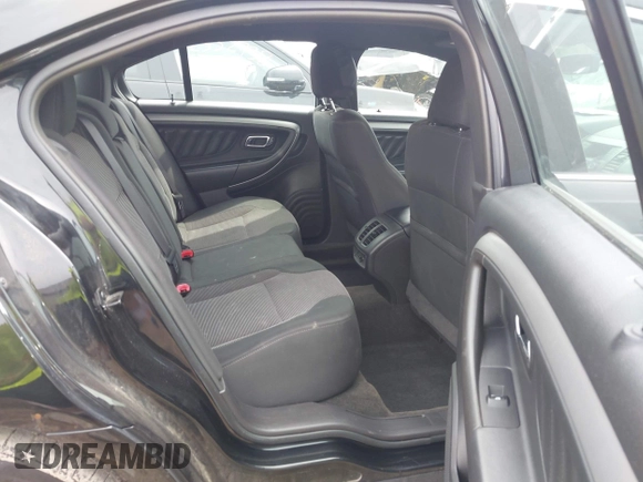 2015 Ford Taurus SEL with VIN 1FAHP2E80FG192017, listed as a IAAI auction lot 42562853 with 124,348 mi miles and . Bid and sale history available at DreamBid. Image 8.