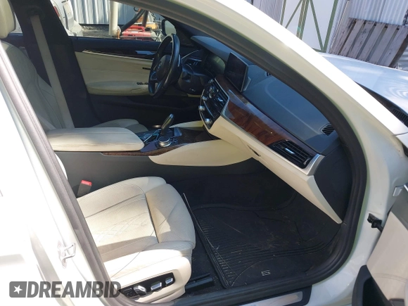 2019 BMW 5 Series 540i xDrive with VIN WBAJE7C52KWW14938, listed as a IAAI auction lot 40177765 with 57,722 mi miles and . Bid and sale history available at carsss.com. Image 5.