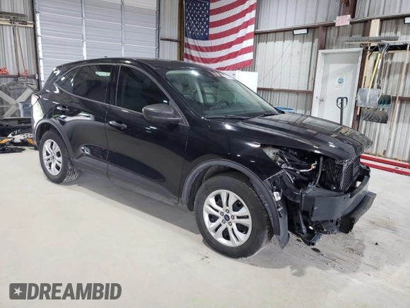 2020 Ford Escape S with VIN 1FMCU9F61LUB70605, listed as a Copart auction lot 58466065 with 70,348 mi miles and Salvage title. Bid and sale history available at DreamBid. Image 4.