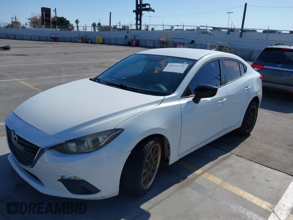 2015 Mazda 3 i SV with VIN JM1BM1T71F1218642, listed as a IAAI auction lot 42142795 with 134,143 mi miles. Bid and sale history available at carsss.com. Image 2.