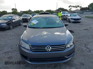 2013 Volkswagen Passat SE w/Sunroof & Nav with VIN 1VWBP7A35DC038217, listed as a IAAI auction lot 41944193 with 102,767 mi miles. Bid and sale history available at carsss.com. Image 12.