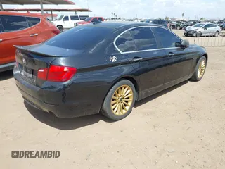 2013 BMW 5 Series 535i xDrive with VIN WBAFU7C51DDU73061, listed as a IAAI auction lot 41960663 with 106,591 mi miles and . Bid and sale history available at carsss.com. Image 4.