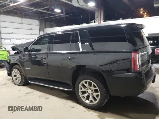 2019 GMC Yukon SLT Standard Edition with VIN 1GKS2DKC4KR393344, listed as a Copart auction lot 51942674 with 76,147 mi miles. Bid and sale history available at carsss.com. Image 2.