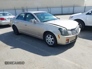 2005 Cadillac CTS z VIN 1G6DP567050160971, wystawiony jako IAAI lot #41938963 z przebiegiem 101 909 mil mil oraz . Historia ofert i sprzedaży dostępna na DreamBid. Obrazek 1.