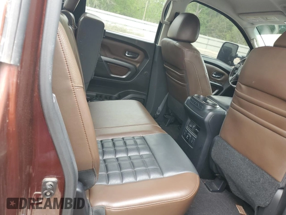 2016 Nissan Titan Platinum Reserve z VIN 1N6BA1F27GN502924, wystawiony jako Copart lot #51345105 z przebiegiem 90 215 mil mil oraz Szkoda całkowita • Salvage title. Historia ofert i sprzedaży dostępna na DreamBid. Obrazek 10.
