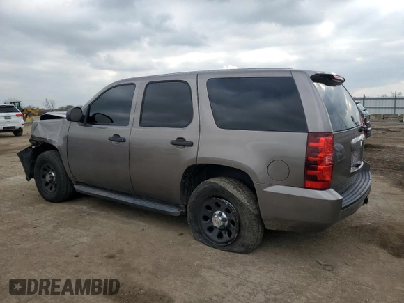 2012 Chevrolet Tahoe Commercial with VIN 1GNSK2E07CR324903, listed as a Copart auction lot 80266624 with 131,700 mi miles and Salvage title. Bid and sale history available at DreamBid. Image 2.