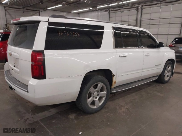 2015 Chevrolet Suburban LTZ with VIN 1GNSKKKC0FR262795, listed as a IAAI auction lot 40767858 with 190,594 mi miles. Bid and sale history available at carsss.com. Image 4.