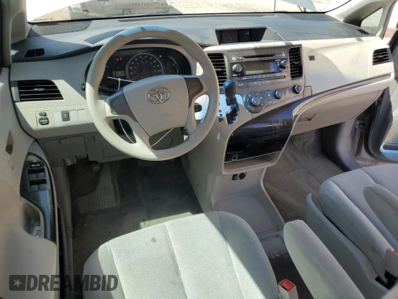 2012 Toyota Sienna with VIN 5TDZK3DC8CS246285, listed as a Copart auction lot 61676185 with 114,700 mi miles and Salvage title. Bid and sale history available at DreamBid. Image 8.