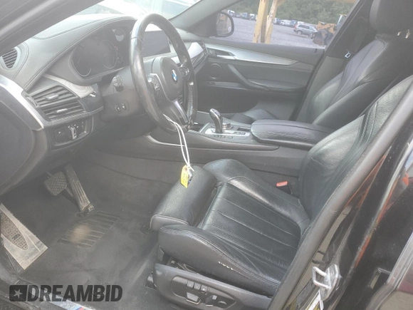 2015 BMW X6 xDrive35i z VIN 5UXKU2C58F0N77513, wystawiony jako Copart lot #55859345 z przebiegiem 82 560 mil mil oraz Szkoda całkowita • Salvage title. Historia ofert i sprzedaży dostępna na DreamBid. Obrazek 7.