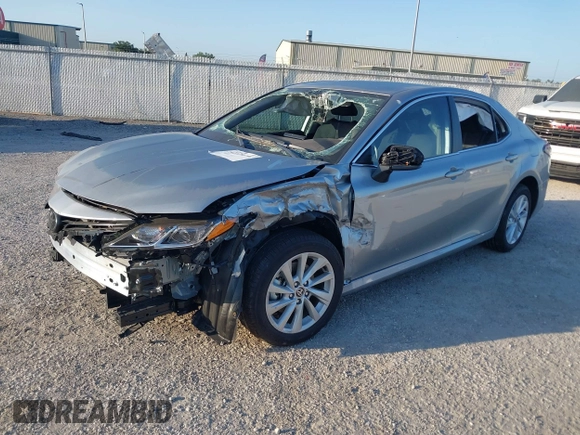 2023 Toyota Camry LE z VIN 4T1C11AK2PU125757, wystawiony jako IAAI lot #42128196 z przebiegiem 5 777 mil mil oraz . Historia ofert i sprzedaży dostępna na DreamBid. Obrazek 17.