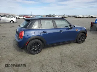 2015 MINI Hardtop 4 Door z VIN WMWXS5C5XFT831166, wystawiony jako Copart lot #78248204 z przebiegiem 69 459 mil mil oraz Szkoda całkowita • Salvage title. Historia ofert i sprzedaży dostępna na DreamBid. Obrazek 3.