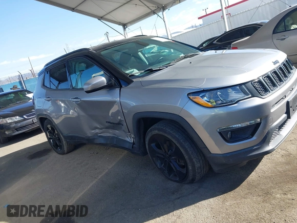2020 Jeep Compass Latitude w/Sun/Safety Pkg with VIN 3C4NJCBB1LT102627, listed as a IAAI auction lot 41657827 with 68,371 mi miles. Bid and sale history available at carsss.com. Image 13.