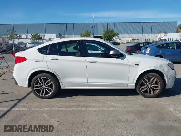 2017 BMW X4 M40i с VIN 5UXXW7C59H0U25191, выставлен на аукционе IAAI как лот 41867852 с пробегом 76 301 миль миль и . История ставок и продаж доступна на DreamBid. Изображение 13.