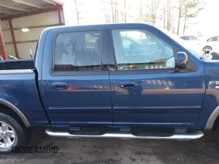 2002 Ford F-150 XLT with VIN 1FTRW086X2KE17566, listed as a IAAI auction lot 41721236 with 98,524 mi miles. Bid and sale history available at carsss.com. Image 13.