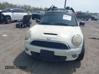 2007 MINI Hardtop S with VIN WMWMF73547TV31403, listed as a IAAI auction lot 42066433 with 156,730 mi miles and . Bid and sale history available at DreamBid. Image 13.