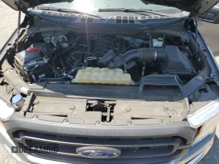 2021 Ford F-150 XL with VIN 1FTMF1C58MKE24095, listed as a Copart auction lot 57686455 with 60,583 mi miles and Salvage title. Bid and sale history available at DreamBid. Image 11.