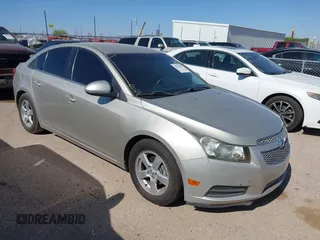 2014 Chevrolet Cruze 1LT with VIN 1G1PC5SB6E7448834, listed as a IAAI auction lot 42582022 with 177,919 mi miles and . Bid and sale history available at DreamBid. Image 1.
