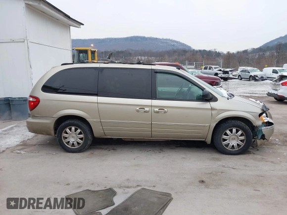 2005 Chrysler Town & Country Touring z VIN 2C8GP54L85R192954, wystawiony jako IAAI lot #41530918 z przebiegiem 242 193 mil mil oraz . Historia ofert i sprzedaży dostępna na DreamBid. Obrazek 13.