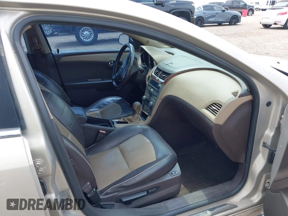2012 Chevrolet Malibu LTZ with VIN 1G1ZG5E75CF273189, listed as a IAAI auction lot 42065802 with 153,869 mi miles and . Bid and sale history available at DreamBid. Image 5.