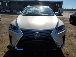 2017 Lexus RX 450h z VIN 2T2BGMCA6HC012036, wystawiony jako Copart lot #57224085 z przebiegiem 101 313 mil mil oraz Szkoda całkowita • Salvage title. Historia ofert i sprzedaży dostępna na DreamBid. Obrazek 5.