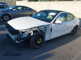 2023 Genesis G70 2.0T z VIN KMTG34TA7PU112073, wystawiony jako IAAI lot #41825012 z przebiegiem 10 526 mil mil oraz . Historia ofert i sprzedaży dostępna na DreamBid. Obrazek 2.