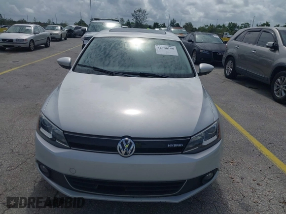 2013 Volkswagen Jetta Hybrid SEL with VIN 3VW637AJ2DM233265, listed as a IAAI auction lot 42746158 with 105,779 mi miles and . Bid and sale history available at DreamBid. Image 6.