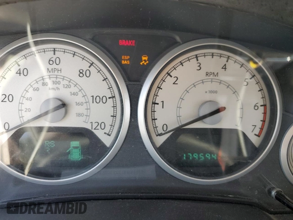 2010 Chrysler Town & Country Touring Plus with VIN 2A4RR8D10AR320628, listed as a Copart auction lot 52600425 with 179,594 mi miles and Salvage Title. Bid and sale history available at DreamBid. Image 9.