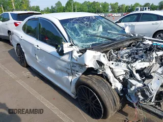 2019 Toyota Camry LE z VIN 4T1B11HK9KU842909, wystawiony jako IAAI lot #42158738 z przebiegiem 87 025 mil mil oraz . Historia ofert i sprzedaży dostępna na DreamBid. Obrazek 1.
