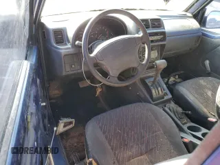 1998 Chevrolet Tracker z VIN 2CNBJ1863W6906496, wystawiony jako Copart lot #87368314 z przebiegiem 144 557 mil mil oraz Czysty tytuł • Clean title. Historia ofert i sprzedaży dostępna na DreamBid. Obrazek 9.