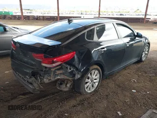 2018 Kia Optima LX with VIN 5XXGT4L39JG251635, listed as a IAAI auction lot 41933408 with 135,718 mi miles. Bid and sale history available at carsss.com. Image 4.