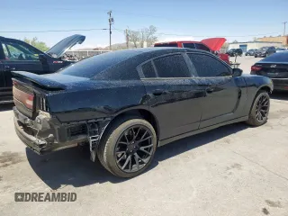 2013 Dodge Charger Police z VIN 2C3CDXAT2DH722403, wystawiony jako Copart lot #59879245 z przebiegiem 195 730 mil mil oraz Szkoda całkowita • Salvage title. Historia ofert i sprzedaży dostępna na DreamBid. Obrazek 3.