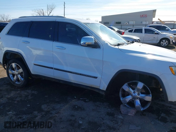 2013 Jeep Grand Cherokee Overland with VIN 1C4RJECT4DC526160, listed as a IAAI auction lot 41429164 with 115,311 mi miles. Bid and sale history available at carsss.com. Image 13.