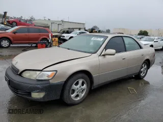 1999 Lexus ES 300 Luxury Sport Sdn with VIN JT8BF28G6X0170859, listed as a Copart auction lot 86406124 with 0 mi miles and Salvage Title. Bid and sale history available at carsss.com. Image 1.