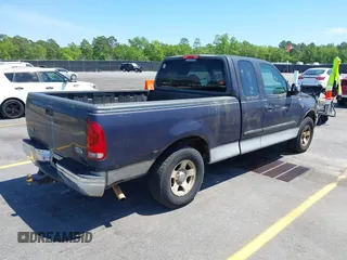 1999 Ford F-150 with VIN 1FTRX17W9XNB32397, listed as a IAAI auction lot 42048746 with 290,179 mi miles and . Bid and sale history available at DreamBid. Image 4.
