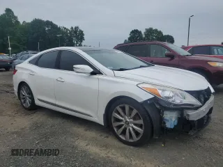 2014 Hyundai Azera Limited z VIN KMHFH4JG9EA342081, wystawiony jako Copart lot #60151565 z przebiegiem 138 351 mil mil oraz Szkoda całkowita • Salvage title. Historia ofert i sprzedaży dostępna na DreamBid. Obrazek 4.