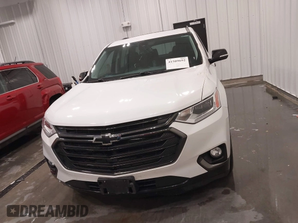 2018 Chevrolet Traverse Premier z VIN 1GNEVJKW4JJ163087, wystawiony jako IAAI lot #41509692 z przebiegiem 118 158 mil mil oraz . Historia ofert i sprzedaży dostępna na DreamBid. Obrazek 12.