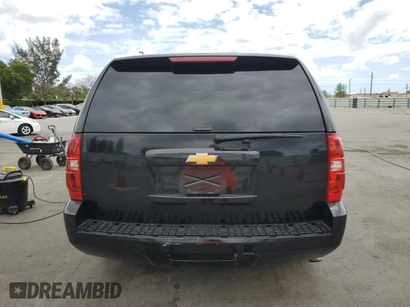 2012 Chevrolet Tahoe Commercial with VIN 1GNLC2E05CR303999, listed as a Copart auction lot 55617295 with 148,326 mi miles and Salvage title. Bid and sale history available at DreamBid. Image 6.