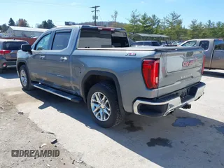 2021 GMC Sierra 1500 SLT z VIN 3GTU9DED7MG224460, wystawiony jako IAAI lot #41848912 z przebiegiem 65 319 mil mil oraz . Historia ofert i sprzedaży dostępna na DreamBid. Obrazek 3.