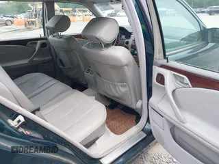 2002 Mercedes-Benz E-Class with VIN WDBJH65J12B462834, listed as a IAAI auction lot 42086848 with 190,720 mi miles. Bid and sale history available at carsss.com. Image 8.