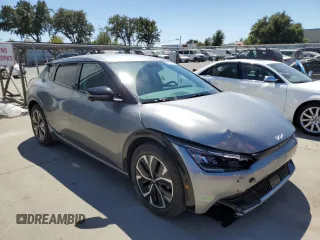 2022 Kia EV6 Wind with VIN KNDC3DLCXN5086669, listed as a Copart auction lot 68265344 with 74,711 mi miles and Salvage Title. Bid and sale history available at carsss.com. Image 4.
